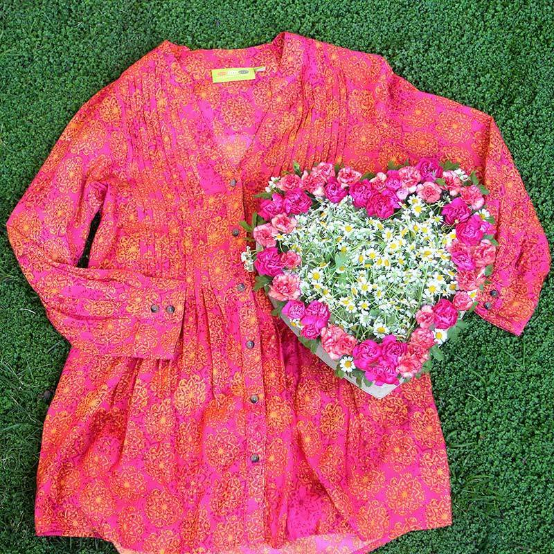 Pink tunic and heart-shaped flower box for Valentine's Day